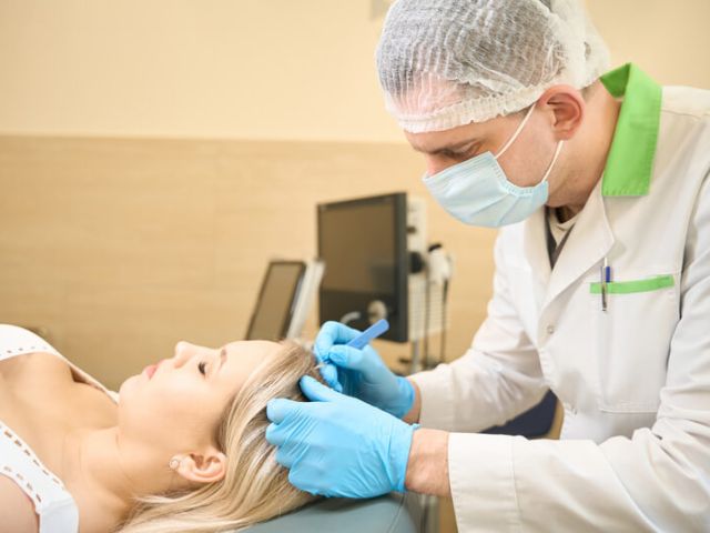 dermatologic-surgeon-removing-atheroma-on-female-p-2024-10-18-17-57-16-utc (1)